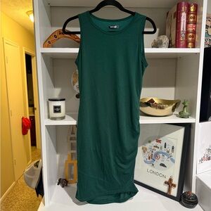 Elegant Green sheath Dress with ruching on the side